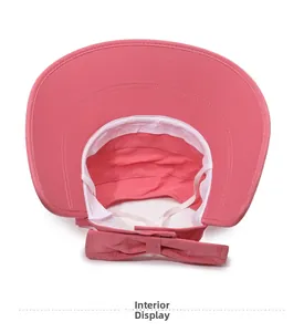 Detail view of pink sun hat interior with sweatband and decorative rear bow tie