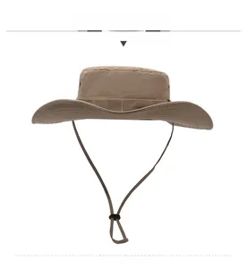 Close-up of khaki wide-brim hiking hat with adjustable chin strap and drawstring cord