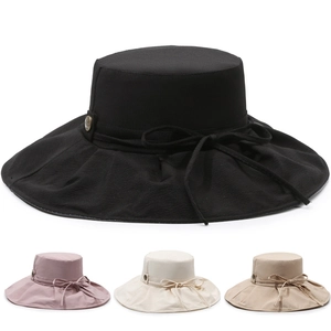 Breathable wide brim sun hat for women in four colors with decorative bow detail