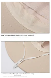 Detailed view of breathable mesh sweatband and adjustable windproof cord on sun hat