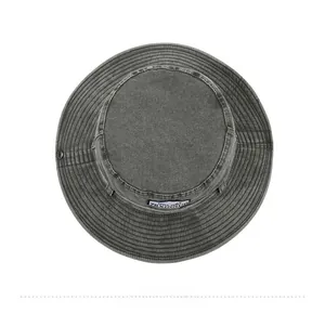 Top view of washed gray cotton bucket hat with vintage texture and reinforced brim