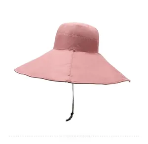Detail view of pink wide brim sun hat for women with adjustable windproof chin strap