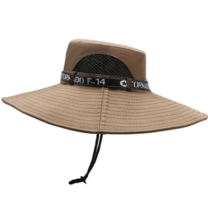 Detail of outdoor sun hat featuring breathable black mesh side vents and windproof chin cord