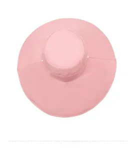 Top down view of wide brim sun hat in cherry blossom pink with fine fabric texture