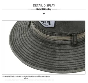 Detail view of cotton outdoor hat featuring extended brim and branded label stitching