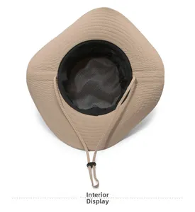 Interior detail of khaki sun hat featuring black mesh lining and adjustable chin strap