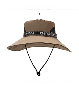 Detail of khaki sun hat featuring breathable black mesh panels and adjustable chin strap