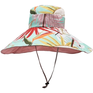 Detailed view of mint green sun hat featuring tropical floral print and adjustable wind cord