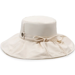Breathable wide brim sun hat in cream white with decorative bow and vintage button