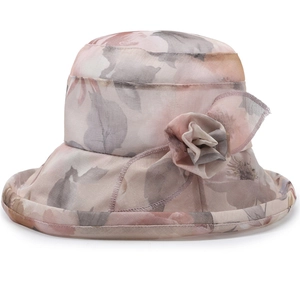 Women's pink floral chiffon sun hat with elegant fabric flower and wavy brim design