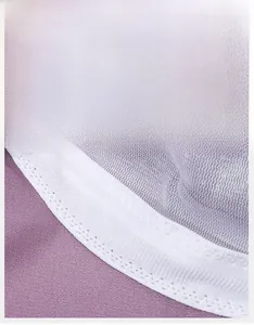 Detail view of breathable white mesh fabric and sweat-wicking band on sun hat interior
