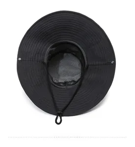 Detail of sun hat with breathable black mesh lining and adjustable chin strap cord