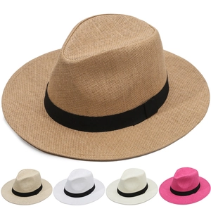 Close-up of woven fedora sun hats showing fine straw texture and ribbon detail in five colors