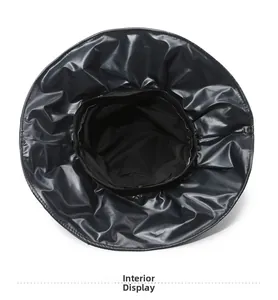 Detail view of the waterproof black wide brim sun hat interior lining and stitching