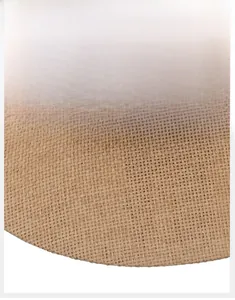 Detail shot of the wide brim and tight weave of this natural straw cowboy sun hat
