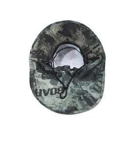 Detail of camouflage fishing hat with breathable lining and adjustable windproof cord