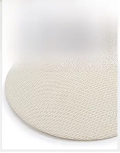 Detailed close-up of the woven texture and large brim of the beige sun visor hat