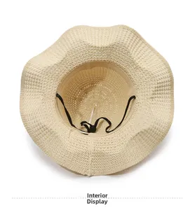 Interior view of beige straw sun hat showing fine weave and adjustable black wind cord