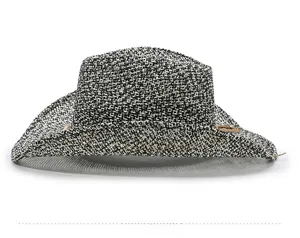 Detail view of the black and white woven texture on a stylish cowboy sun hat