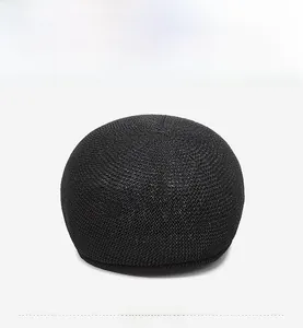 Front view of a black breathable mesh straw beret hat showing fine weaving texture