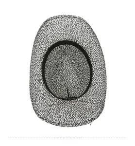Close-up of internal sweatband and mixed weave texture of the straw sun hat
