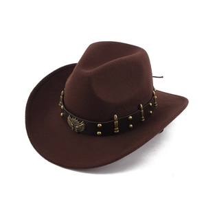 Detail of dark brown wool felt cowboy hat with leather band and eagle eagle emblem