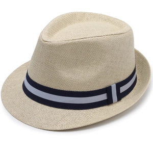 Detailed close-up of woven paper straw texture and navy striped band on a summer fedora hat
