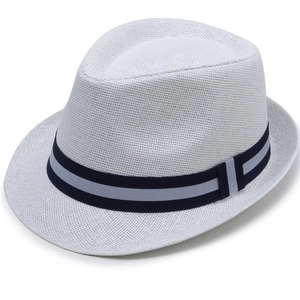 Close-up of white woven Panama hat with blue striped ribbon and fine straw texture