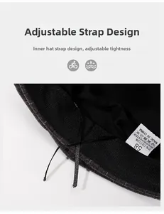 Detail of adjustable inner cord and material label on vintage plaid newsboy hat
