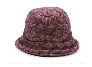 Detailed back view showing the textured dark purple fabric and bow of the bucket hat