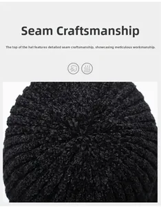 Detail of reinforced radial stitching on the top of a black fleece thermal knit beanie hat