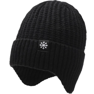 Close-up of black ribbed knit winter beanie with snowflake patch and ear protection