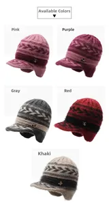 Detail view of five warm knit hats with ear protection and metal butterfly accents