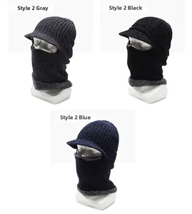 Detail of warm winter knitted mask hat with thick fleece lining in grey black and blue