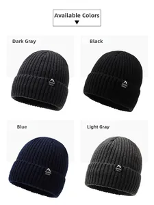 Selection of four knitted beanies in dark grey, black, blue and light grey with mountain logo