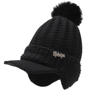 Thick black winter knit hat with faux fur pompom, ear flaps and peak brim on white background