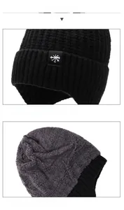 Detail of warm winter beanie with snowflake patch and grey thermal fleece lining