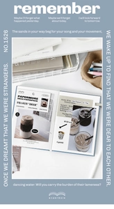 Close-up of PaperMore vintage style scrapbooking papers with lifestyle illustrations