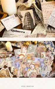 Close-up of vintage junk journal materials featuring old stamps and butterfly ephemera