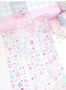 Close-up of cute cartoon PET stickers featuring bears and bunnies for scrapbooking