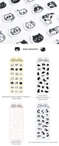 Macro detail of 3D felt-texture cat stickers featuring black and white kittens for journaling