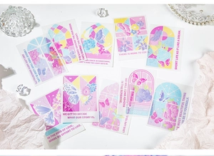 Detail of translucent PVC butterfly cards with floral patterns and aesthetic quotes