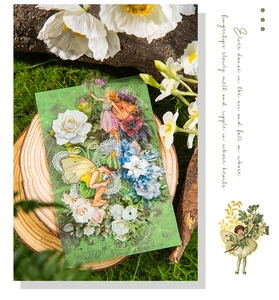 Close-up of PET flower fairy sticker featuring gold stamping on a rustic wooden slice