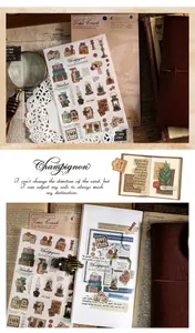 Detail shot of vintage aesthetic stickers on stationery with old paper and lace textures