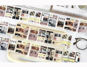 Macro shot of vintage smartphone UI themed PET decorative tapes for journaling