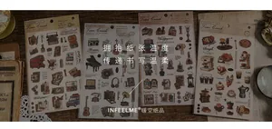 Retro vintage lifestyle stickers featuring typewriter, coffee, and old books on wood surface