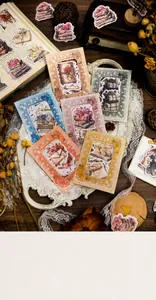 Macro view of vintage style washi paper stickers with frame designs on retro background