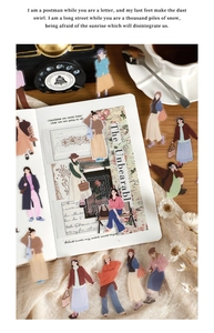 Flat lay of vintage PET stickers featuring fashion women illustrations on a journal
