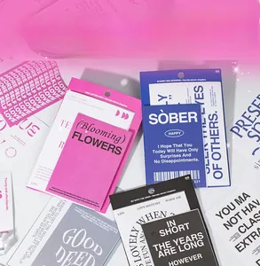 Flat lay of aesthetic English quote stickers for DIY journaling in various colors