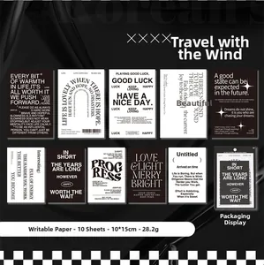 Flat lay of 10 minimalist black and white decorative cards with artistic typography